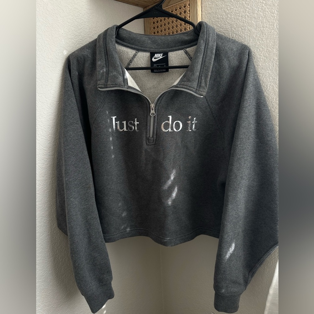 Medium dark gray cropped Nike quarter zip sweater